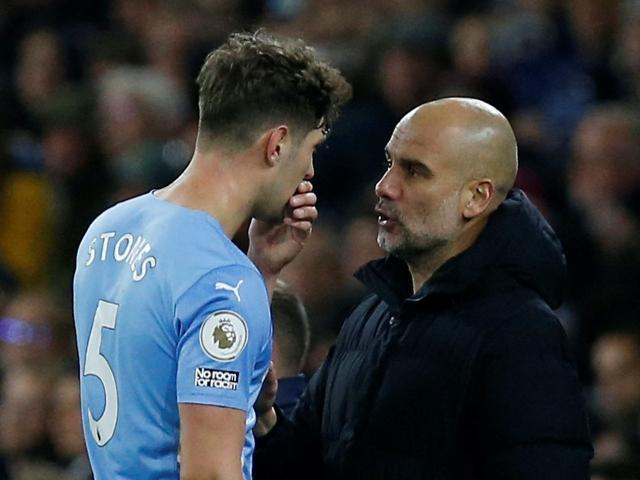 john-stones-pep-guardiola.jpg